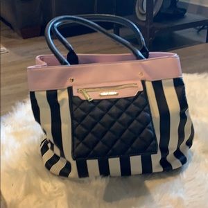 Betsey Johnson pink and white black stripe purse.